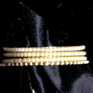 4 faux pearl bangles